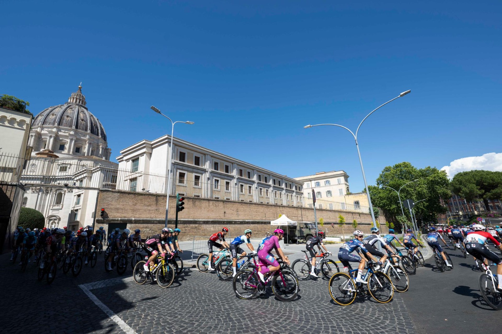 Pope Leo XIV greeted the riders as they passed through Vatican City ...