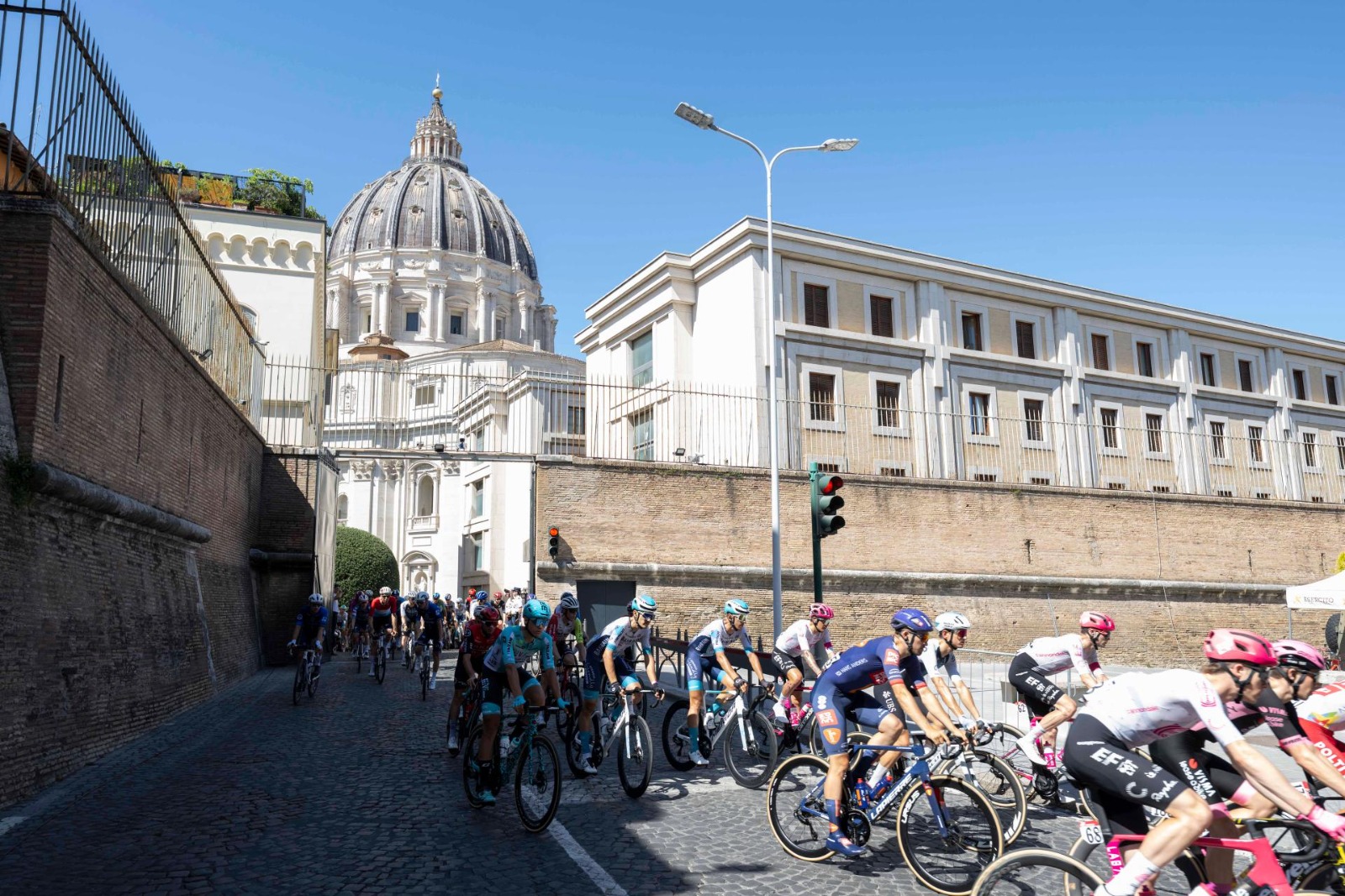 Pope Leo XIV greeted the riders as they passed through Vatican City ...